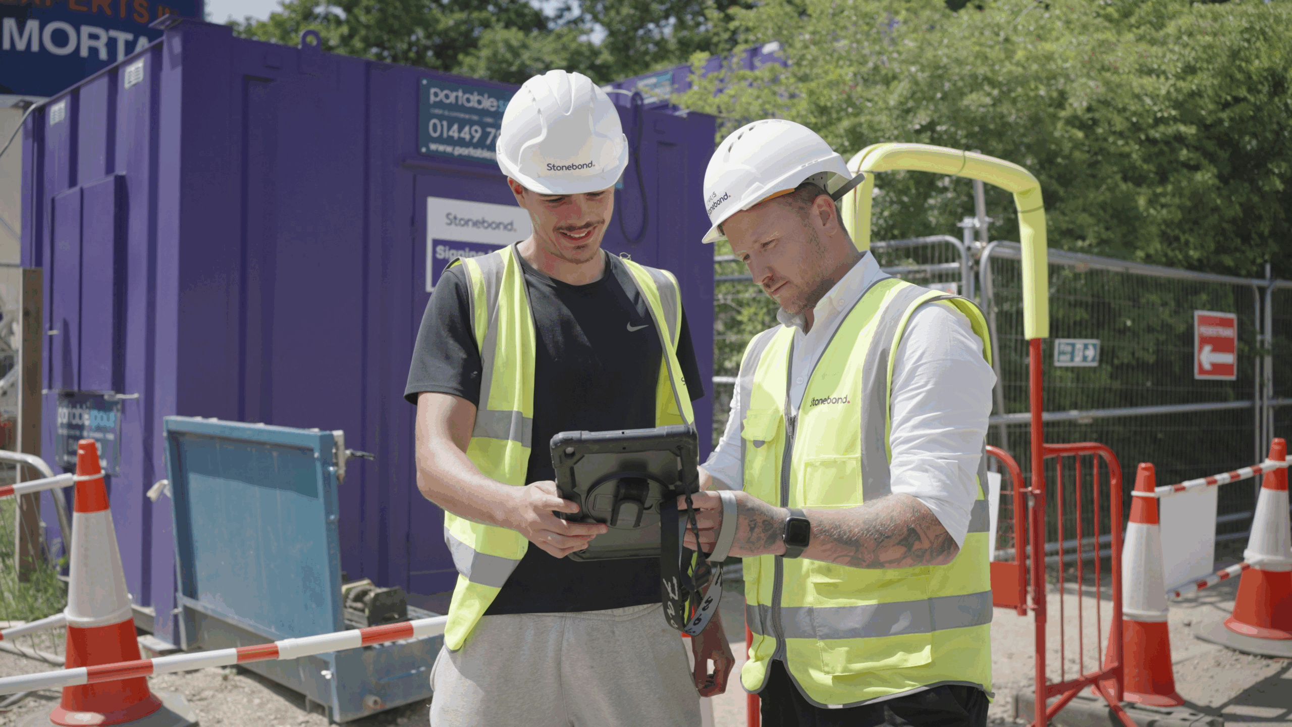 Stonebond team using tablet